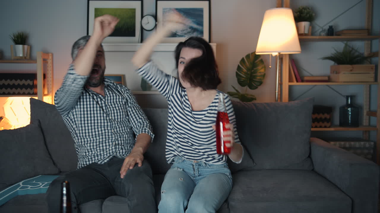 Couple Watching a Game Together