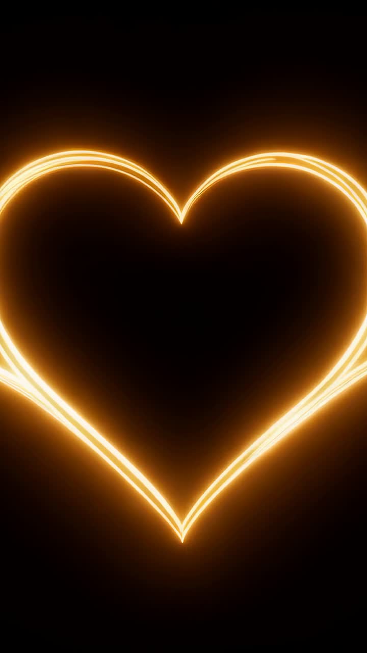 Video verticale: all'inizio, scie traccianti che formano il contorno di un cuore dorato luminoso su nero, alone pulsante