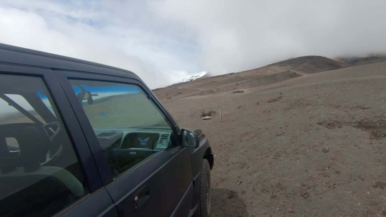 Jeep rough terrain Cotopaxi National park Ecuador landscape land Andes mountains