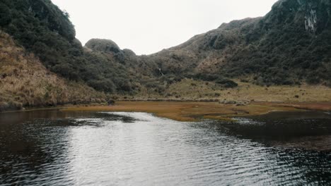 Tranquil-Lake-Surrounded-With-Forest-Mountains-In-Cayambe-Coca-National-Park-Near-Papallacta-In-Napo-Province,-Ecuador