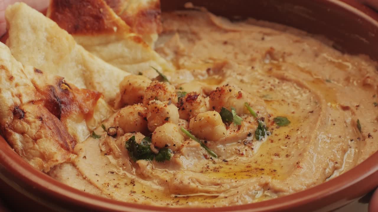 Fresh marbled beef with pepper, salt and rosemary close-up macro. Cooking juicy steak on grill with oil. Premium organic wagyu meat. High quality 4k footage