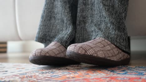 person wearing slippers and pants