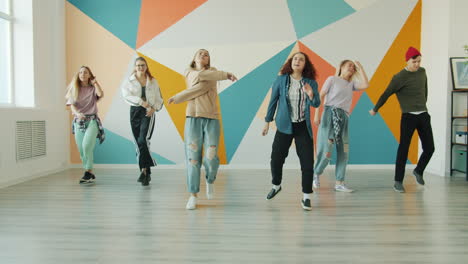 teenagers dancing in a dance studio