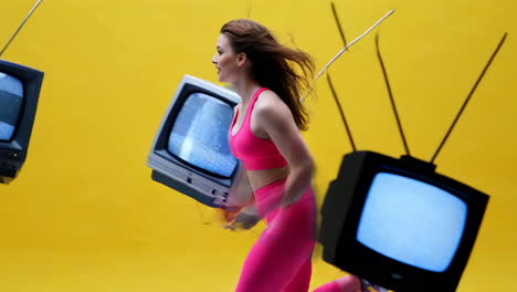 woman running with retro televisions