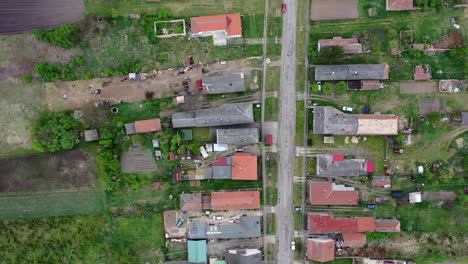 Flying-over-village-area-in-summer