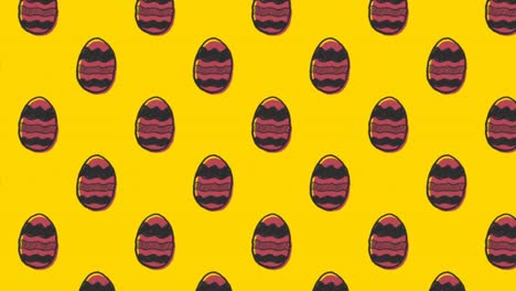Animation-of-patterned-Easter-eggs-moving-in-rows-on-yellow-background