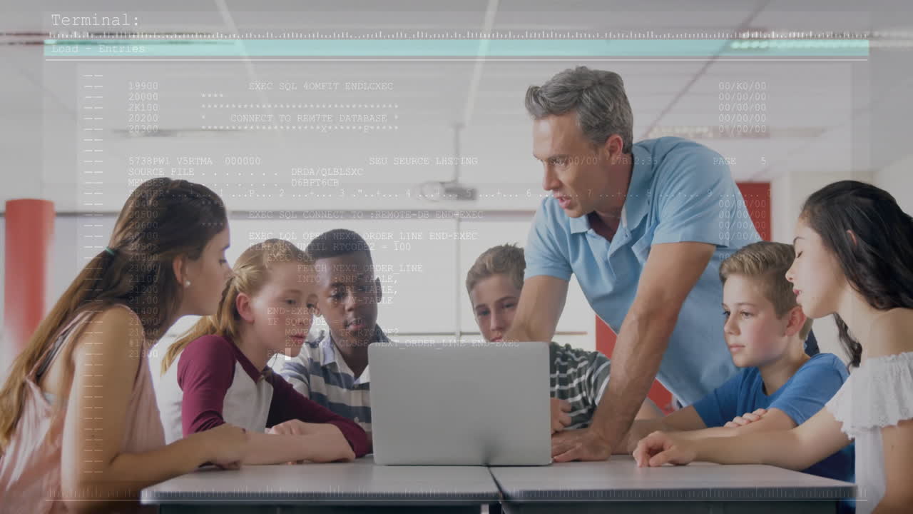 Male teacher leaning over table guiding students on laptop, with animated education charts hovering