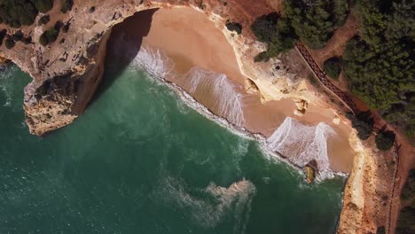 An-amazing-view-from-above-of-the-Corredoura-Beach-in-Algarve,-Portugal