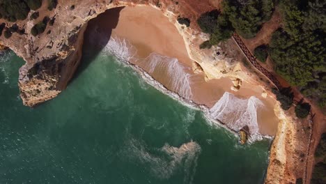 an amazing view from above of the corredoura beach in algarve, portugal