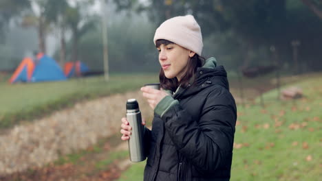 woman, winter and drinking tea for camping outdoor