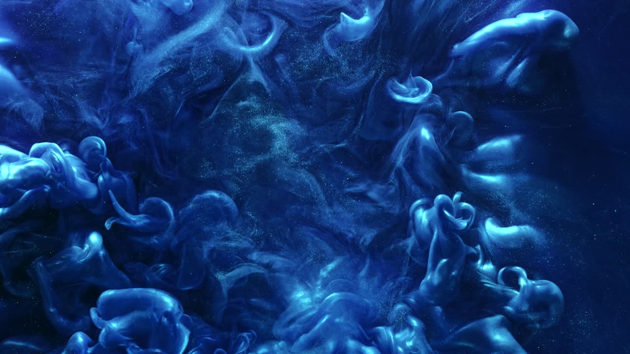 Esplosione di pittura, sovrapposizione, glitter blu, movimento liquido