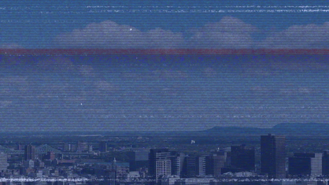 Animation of interference over cityscape and blue sky
