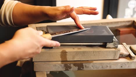 sequential steps of attaching a handle to a knife