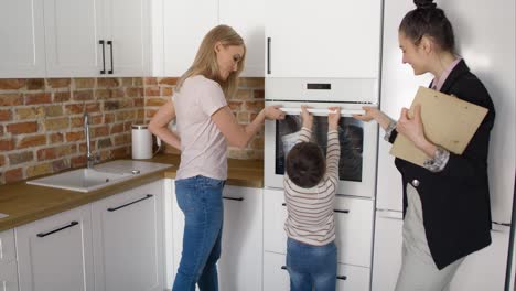 video of woman and her son watching a new apartment