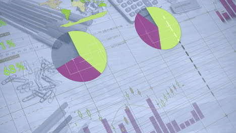 animation of data processing and diagrams over office table with equipment