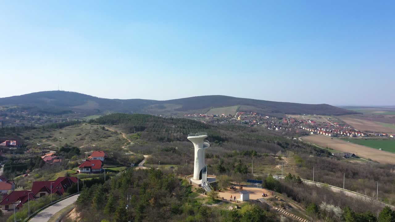 Viewpoint on the top of the hill. View to the lake Velencei, HungaryDrone moves fast forward and up