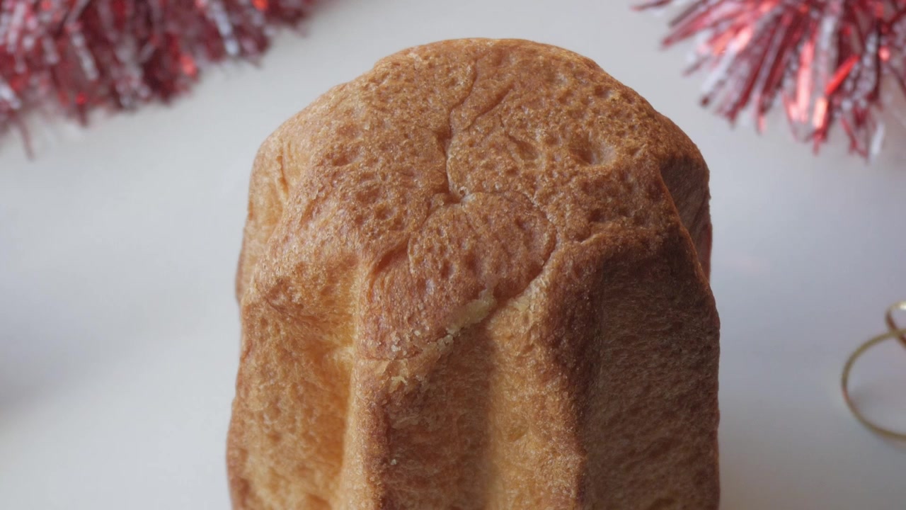 Delicious panettone with Christmas decor creating a festive holiday mood
