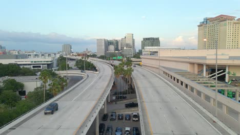 cars driving on bridge highway arriving to tampa downtown