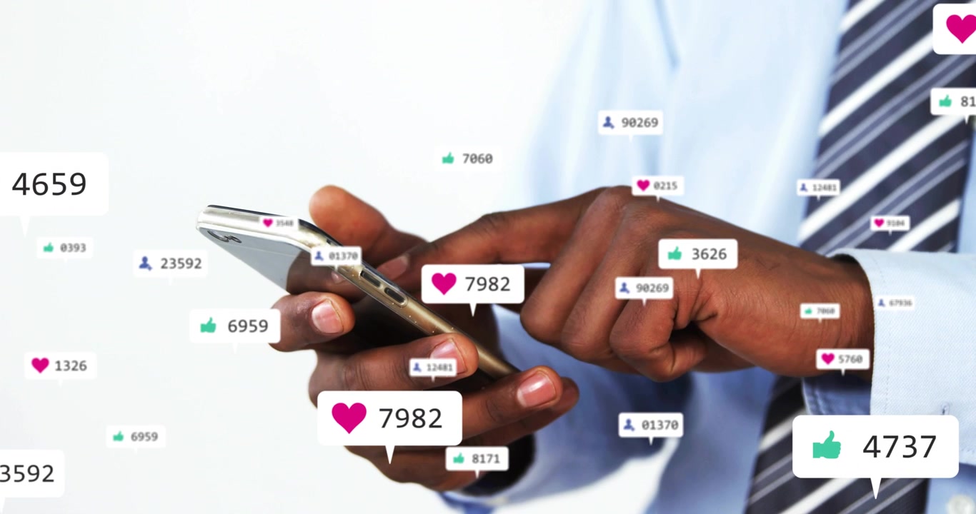 Executive tapping smartphone in white backdrop, driving social media heart and like counters rising