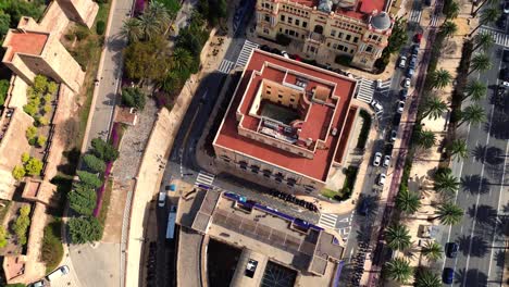 Alcazaba-castle-walls-and-Malaga-town-hall-aerial-drone-view-south-Spain