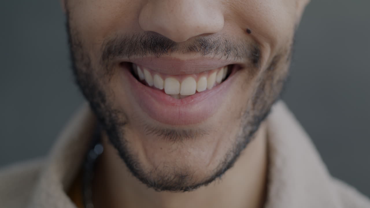 Close-up of a smiling man's face