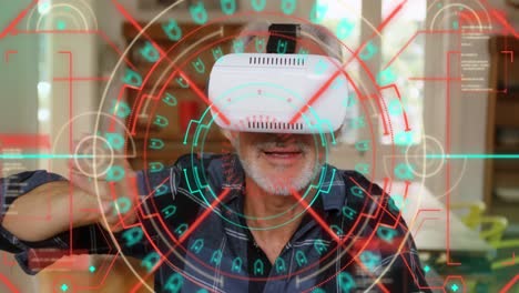 Data-processing-and-scope-scanning-over-caucasian-senior-man-wearing-vr-headset-at-home