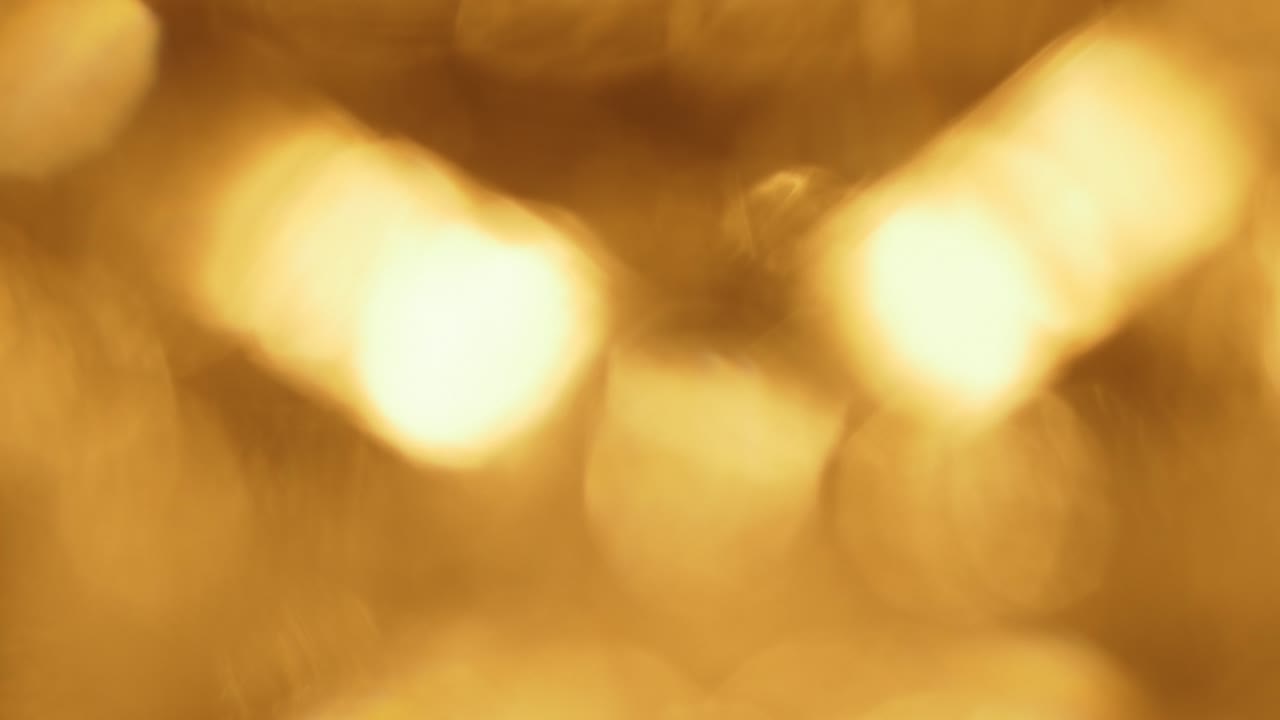 Vazamentos de Luz Dourados Abstratos e Sobreposição Bokeh