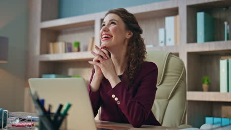 happy businesswoman enjoying success at buro. joyful manager reading good news