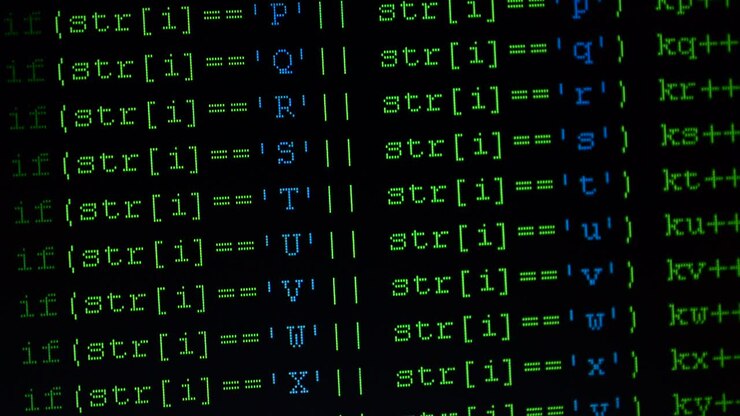 Source code on the monitor screen. Shooting of the text of the computer program