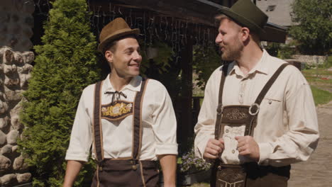 men in traditional german clothing walking outside