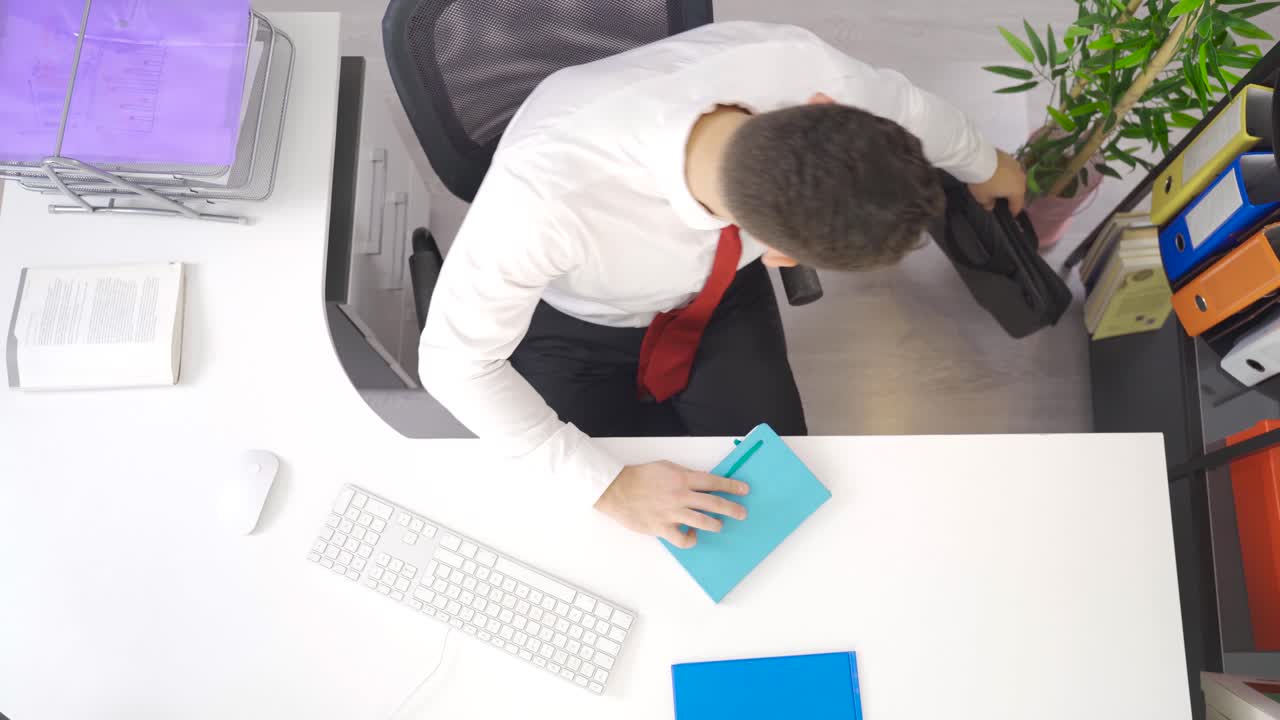 Businessman starts work, comes to office. A new day.