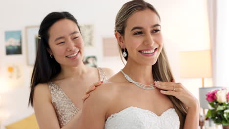 wedding, bride and bridesmaid looking happy