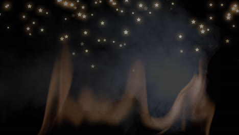 animación de estrellas de navidad cayendo sobre el humo en fondo negro