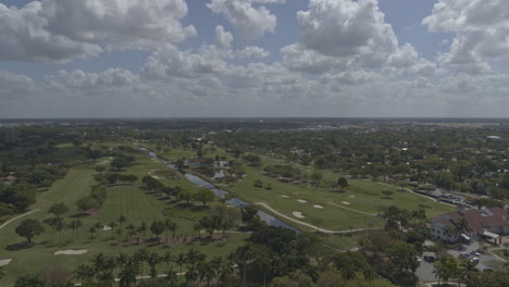 fort myers florida aerial v6 panning aerial over the country club golf course and surrounding suburbs - dji inspire 2, x7, 6k - march 2020