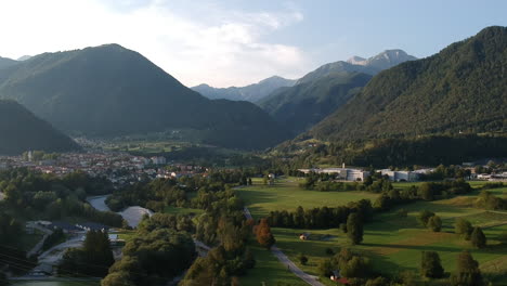 aerial drone shot of the town of tolmin in slovenia next to the so