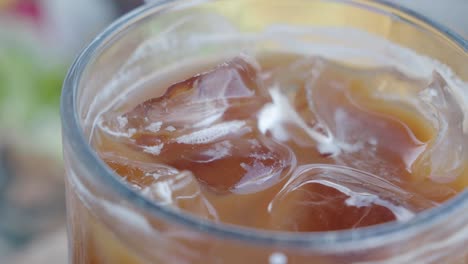 close up of iced coffee in a glass