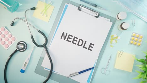 needle written on medical paper