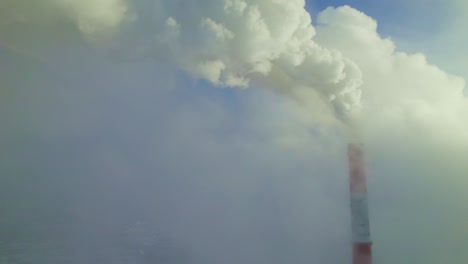 smokestacks and fog