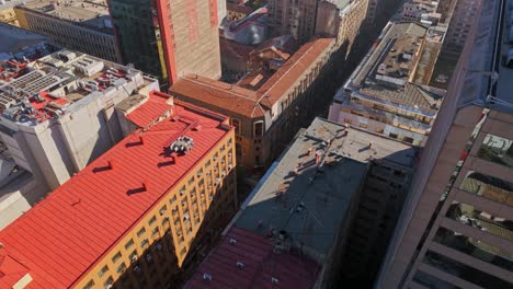 establishing shot of antique architecture buildings on thr streets of santiago