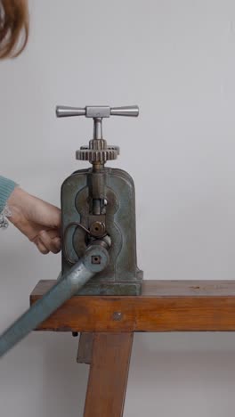 operating a vintage metalworking rolling mill
