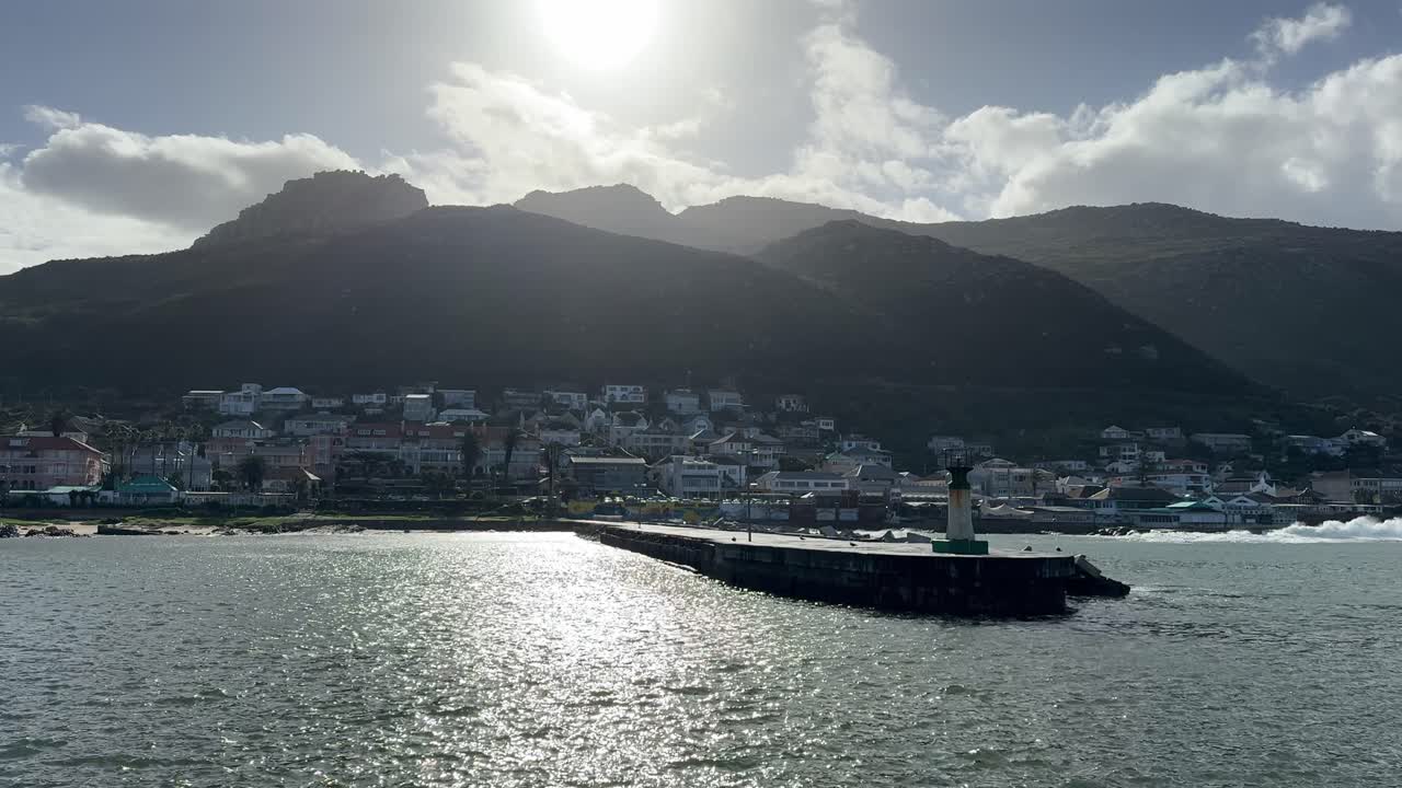 View of Kalk Bay near Cape Town harbour in the late afternoon light on a winter’s day.