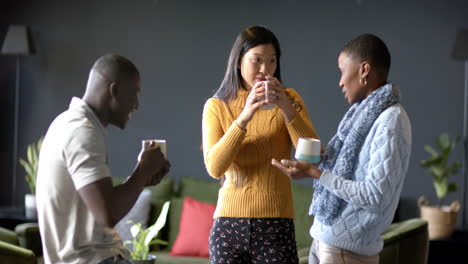 casual diverse business people talking together in office, slow motion, copy space