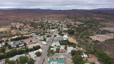 countryside aerial shot of a little south african city cloudy day