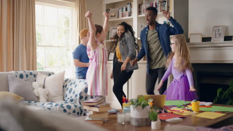 happy multiracial family dancing at home having fun enjoying dance celebrating exciting weekend together 4k footage