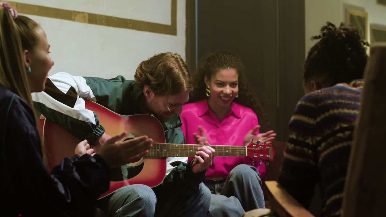 Young man playing the guitar