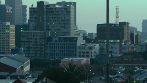 General-view-of-cityscape-with-multiple-modern-buildings-and-cloudless-sky