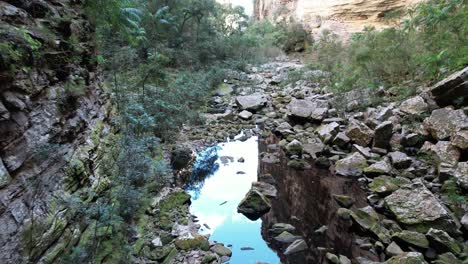 fumacinha waterfall crevice with reflection, vale do pati, chapada diamantina, bahia, brazil