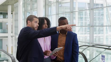 young business people talking in a modern office building