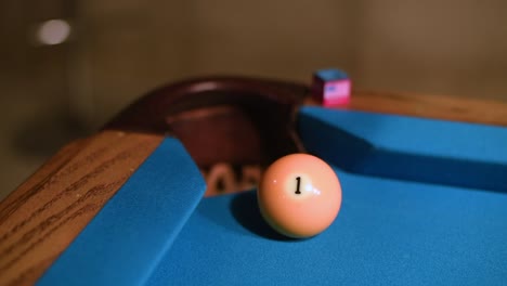 close up of one ball shot in the corner pocket american pool