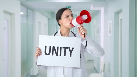 angry indian female doctor protesting for unity